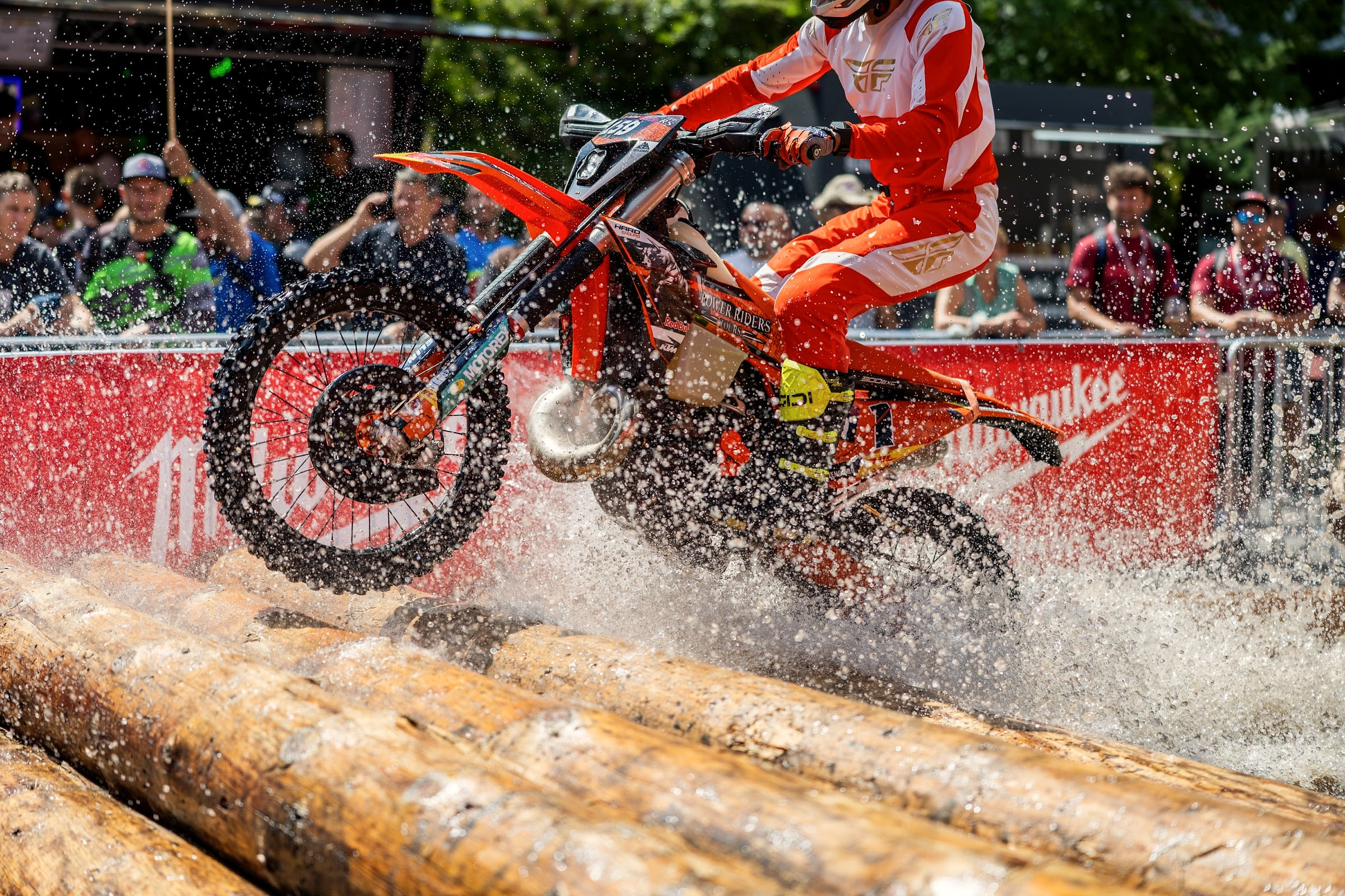 Power Riders Tours KTM clearing the log obstacle in the Red Bull Romaniacs prologue in Sibiu